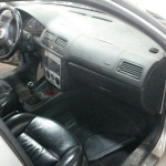 interior of a twin-engine Jetta with VR6 and W8 motors