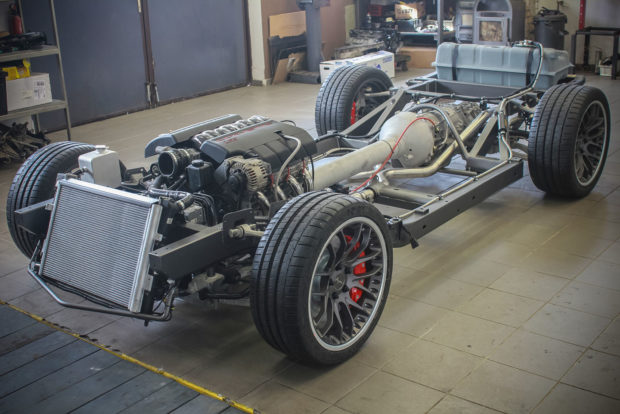 C6 Corvette rolling chassis and powertrain ready to be installed under a C3 Corvette